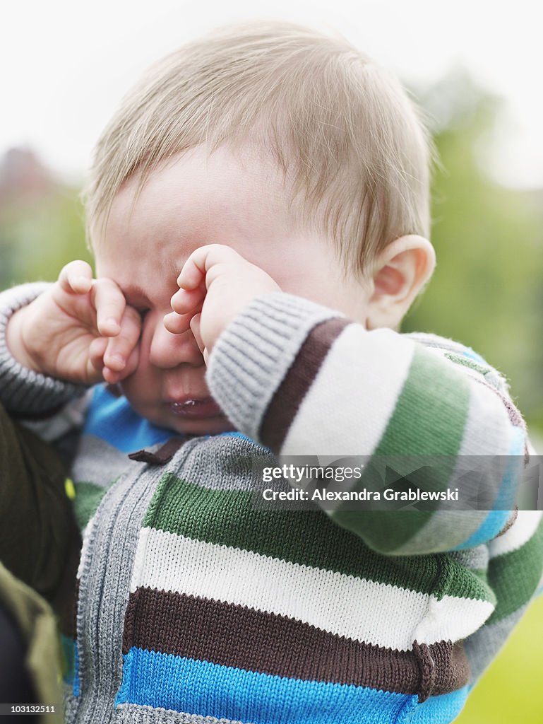 Baby Boy Rubbing His Eyes