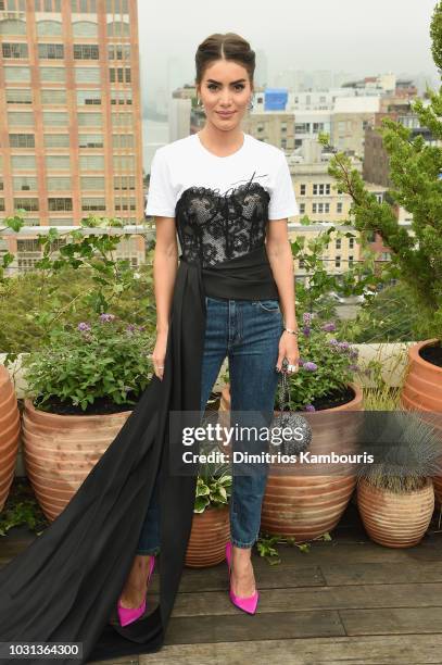 Camila Coelho attends the Oscar De La Renta front Row during New York Fashion Week: The Shows at Spring Studios Terrace on September 11, 2018 in New...