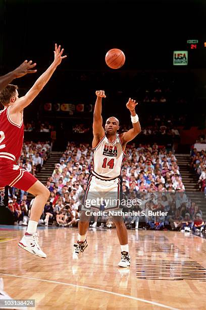 Charles Barkley of the USAB Dream Team passes to a teammate during the 1992 Olympics in Barcelona, Spain in 1992. NOTE TO USER: User expressly...