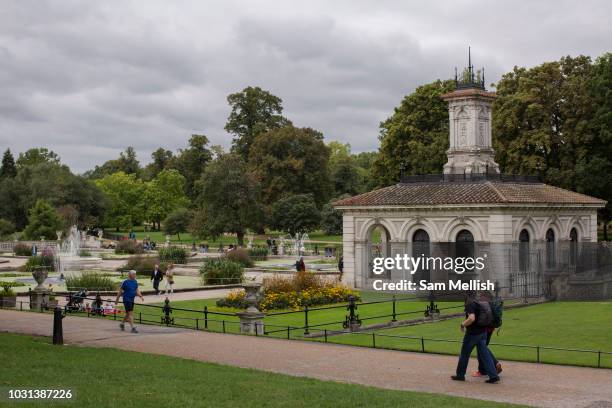 The Italian Gardens in Hyde Park on the 27th August 2018 in Central London in the United Kingdom. The Italian Gardens are an elaborate mix of four...