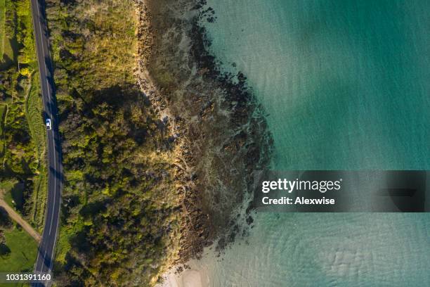 coastal road aerial mt martha - drone point of view car stock pictures, royalty-free photos & images