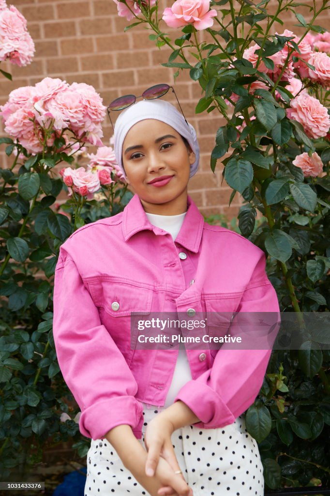 Cool Muslim woman with pink roses