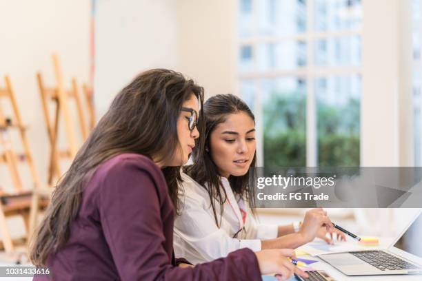 two business woman discussing ideas on a meeting - accounting services stock pictures, royalty-free photos & images