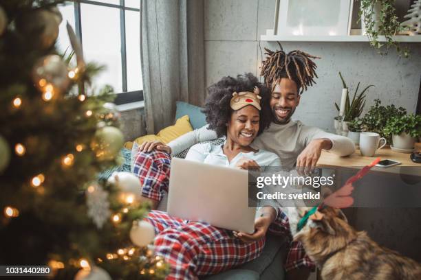 lazy christmas morning - christmas movie stock pictures, royalty-free photos & images