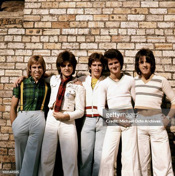 Scottish rock band 'The Bay City Rollers' pose for a portrait in circa 1975 in Los Angeles, California. Derek Longmuir, Eric Faulkner, Alan Longmuir,...