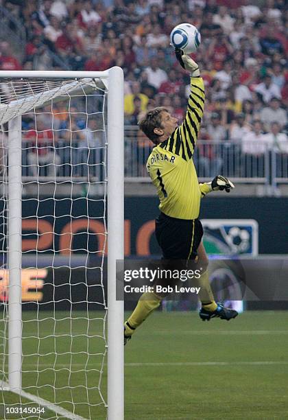 Edwin van der Sar of Manchester United makes a save during the MLS All Star Game at Reliant Stadium on July 28, 2010 in Houston, Texas.