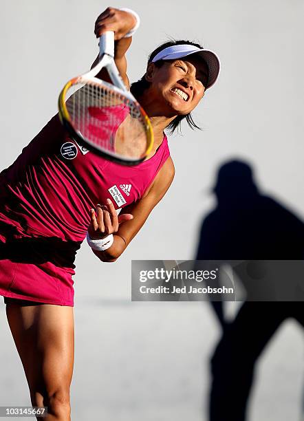 Kimiko Date Krumm of Japan serves against Elena Dementieva of Russia during Day 2 of the Bank of the West Classic at Stanford University on July 28,...