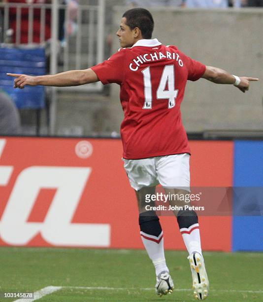 Javier "Chicharito" Hernandez of Manchester United celebrates scoring their fifth goal, his first for the club, during the MLS AllStar match between...