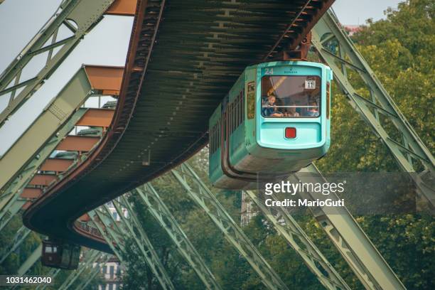 elevated cable car system in wüppertal, germany - wuppertal stock pictures, royalty-free photos & images