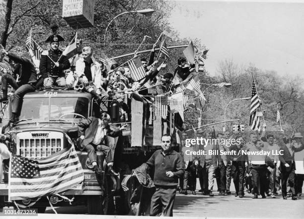 Marchers came carrying American flags at the Pro-Vietnam War Parade on Fifth Avenue in Manhattan on May 13, 1967.