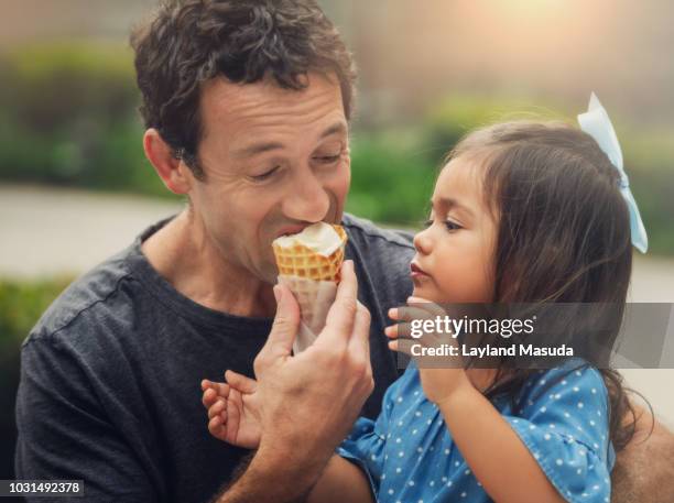 Learning To Share - Dad And Child