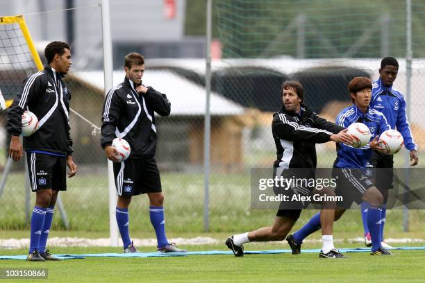 Eric-Maxim Choupo-Moting, Dennis Diekmeier, Ruud van Nistelrooy, Heung-Min Son and Lennard Sowah exercise during the pre-season training camp of...