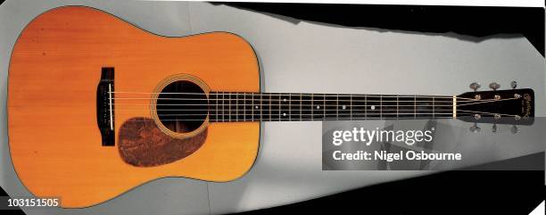 Studio still life of a 1939 Martin D-18 acoustic guitar, photographed in the United Kingdom.