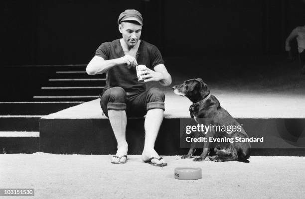 English actor Patrick Stewart as Launce, with his dog Crab, during rehearsals for Robin Phillips' production of 'Two Gentlemen Of Verona' for the...