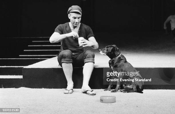 English actor Patrick Stewart as Launce, with his dog Crab, during rehearsals for Robin Phillips' production of 'Two Gentlemen Of Verona' for the...