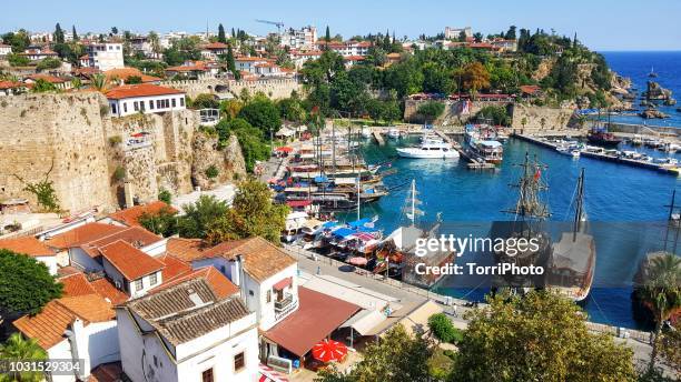 top view of antalya city and harbour with moored ships - antalya city stock-fotos und bilder