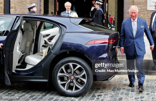 Prince Charles, Prince of Wales gets into his new chauffeur driven Jaguar I-PACE fully electric car following a visit to the newly refurbished...