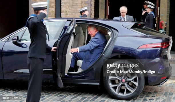 Prince Charles, Prince of Wales gets into his new chauffeur driven Jaguar I-PACE fully electric car following a visit to the newly refurbished...