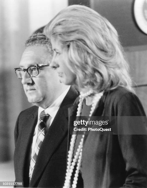 German-born American statesman US Secretary of State Henry Kissinger and his wife, Nancy Kissinger , as they attend a White House reception,...