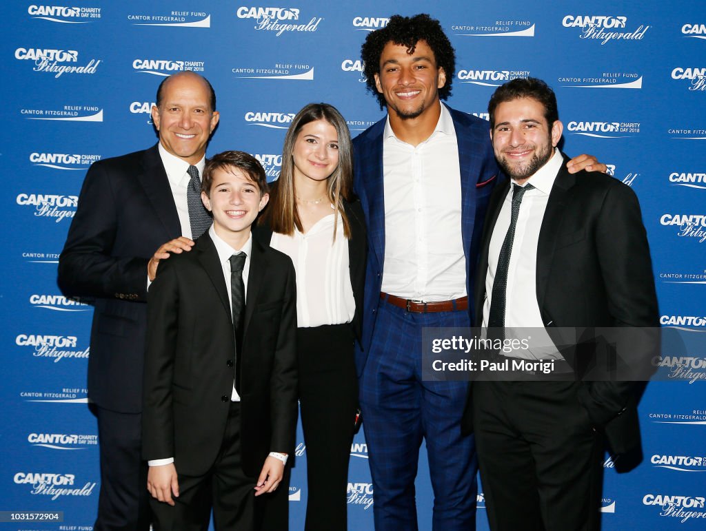 Howard Lutnick, Ryan Lutnick, Casey Lutnick, Evan Engram and Kevin