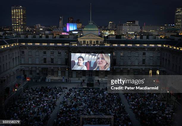 Londoners watch a Film4 Summer Screen showing of the new action-comedy adventure 'Knight and Day' at Somerset House on July 29, 2010 in London,...