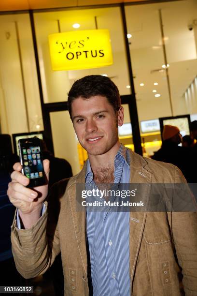 Actor Angus Willoughby poses during the launch of the iPhone 4 at the Murray Street Mall Optus store on July 29, 2010 in Perth, Australia.