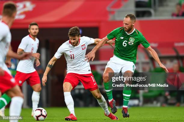 David Meyler of Republic of Ireland tackles Mateusz Klich of Poland during the International Friendly match between Poland and Republic of Ireland at...