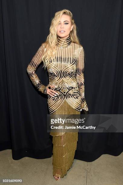 Carmen Electra poses backstage for Naeem Khan during New York Fashion Week: The Shows at Gallery I at Spring Studios on September 11, 2018 in New...