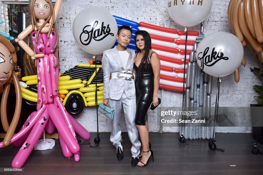 Ezra J. Williams and Nichapat Suphap attend as Saks celebrates AdR