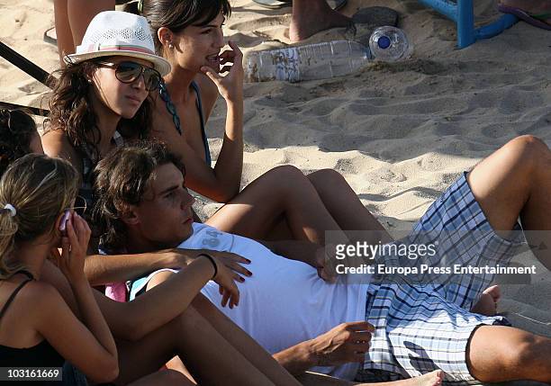 Spanish tennis player Rafael Nadal is seen playing football at the beach and enjoying the summer with his girlfriend Xisca Perello and some friends...