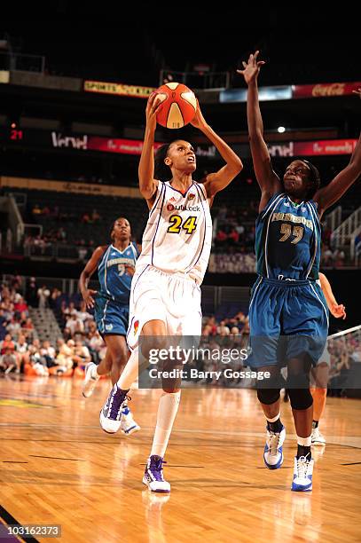 DeWanna Bonner of the Phoenix Mercury shoots against Hamchetou Maiga-Ba of the Minnesota Lynx on July 29, 2010 at U.S. Airways Center in Phoenix,...