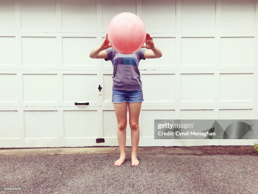 Girl with Bouncy Ball Head