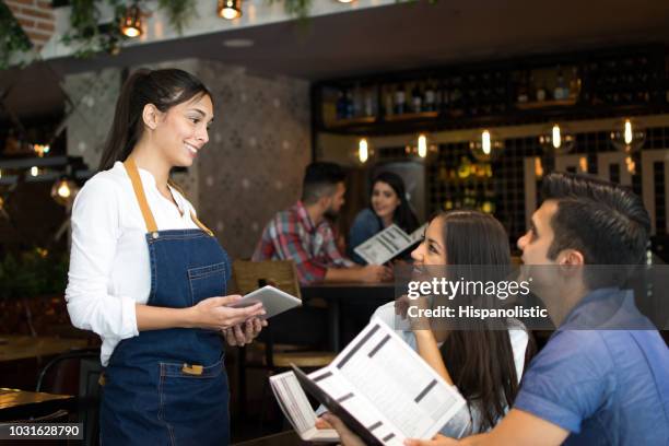 Waiter Using Digital Tablet Photos and Premium High Res Pictures ...
