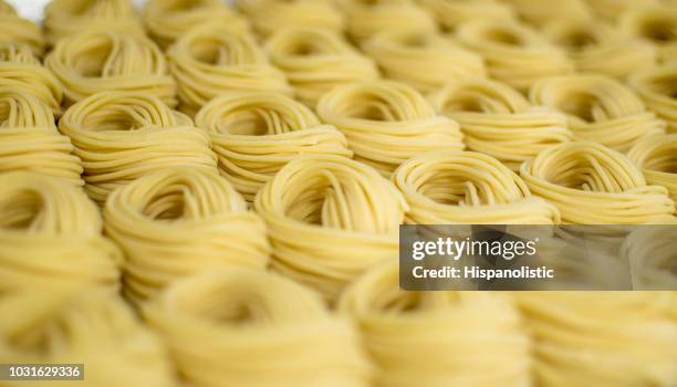 close up of fresh pasta - making pasta stock pictures, royalty-free photos & images