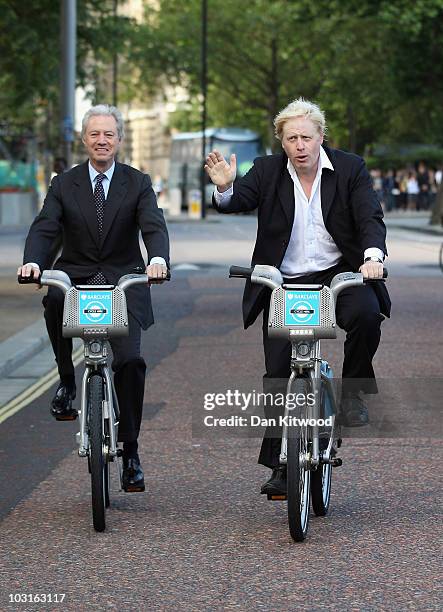 Mayor of London Boris Johnson and Barclays Chairman, Marcus Agius cycle on bicycles at the launch of London's first ever cycle hire scheme on July...