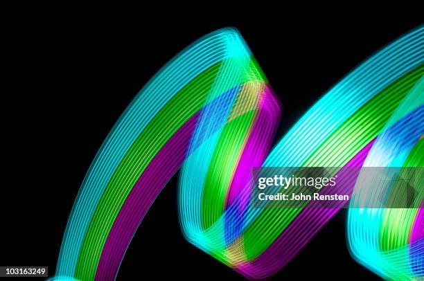 multi colour abstract light trails - zigzag stock pictures, royalty-free photos & images