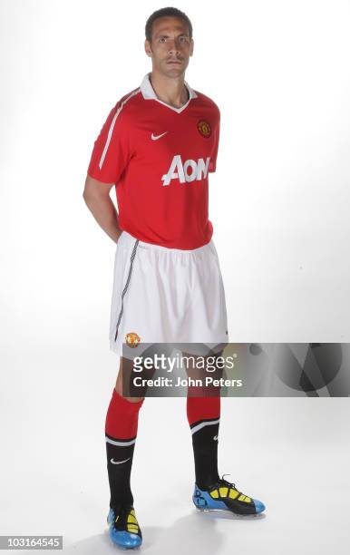 Rio Ferdinand of Manchester United poses in the new Manchester United home kit for the 2010/2011 season on April 14, 2010 in Manchester, England.