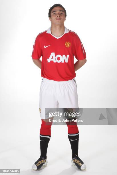 Rafael Da Silva of Manchester United poses in the new Manchester United home kit for the 2010/2011 season on April 14, 2010 in Manchester, England.