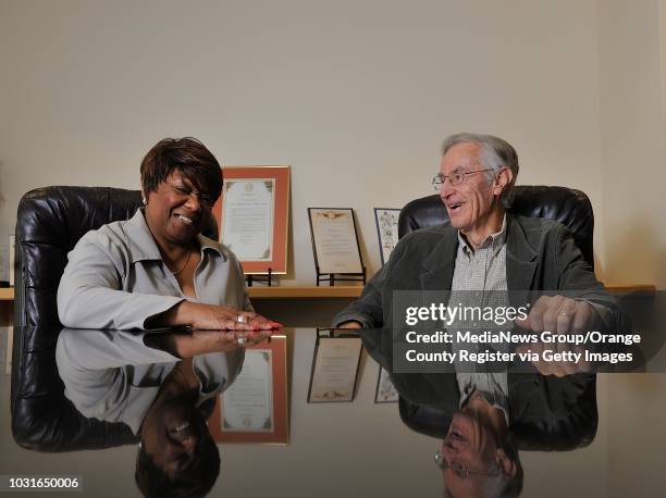 Denise Y. Cato, president and CEO of the Fair Housing Council of Orange County and Bob Johnson, president of the group's board, in their new offices...