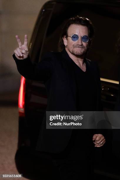 Irish lead singer of rock band U2, Paul David Hewson aka Bono leaves the Elysee Palace, in Paris, after a meeting with French President, on September...