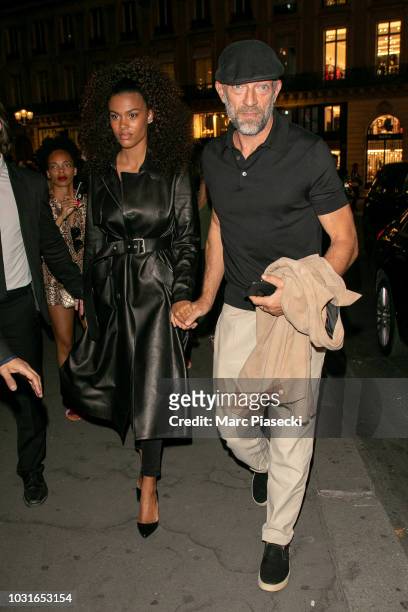 Tina Kunakey and Vincent Cassel are seen arriving at the Longchamp 70th Anniversary Celebration at Opera Garnier on September 11, 2018 in Paris,...