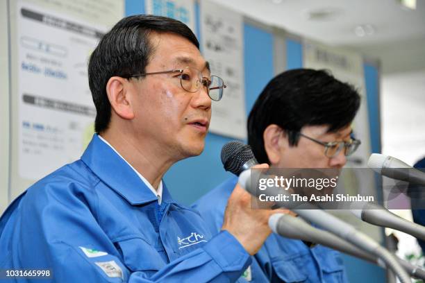 Hokkaido Electric Power Co executives attend a press conference at the company headquarters on September 11, 2018 in Sapporo, Hokkaido, Japan. A male...