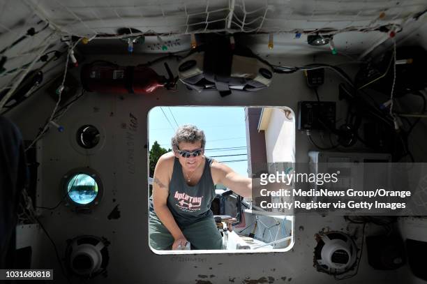 Angela Madsen on her ocean-crossing row boat at her home in Long Beach, CA on August 6, 2010. Madsen recently rowed around Great Britain as part of...