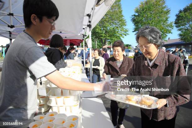 Meals are offered at an evacuation center on September 11, 2018 in Atsuma, Hokkaido, Japan. A male resident in Atsuma who was the last reported...