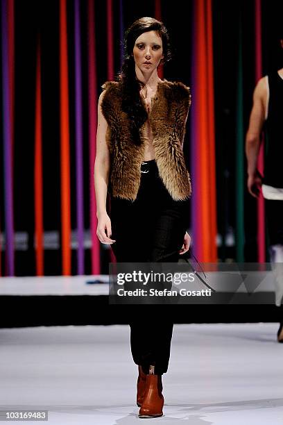 Model showcases a design by Arj Selvam on the catwalk during the StyleAid Perth Fashion Event 2010 at the Burswood Entertainment Complex on July 30,...