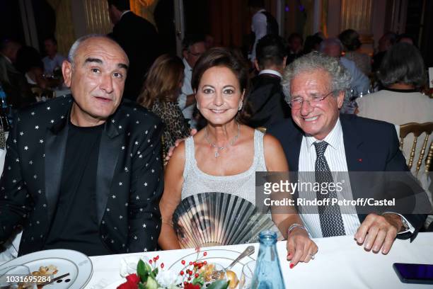 Producer Pascal Negre, Julie Oks and Laurent Dassault attend the "Vaincre Le Cancer" : Benefit Party at Cercle de l'Union Interalliee on September...