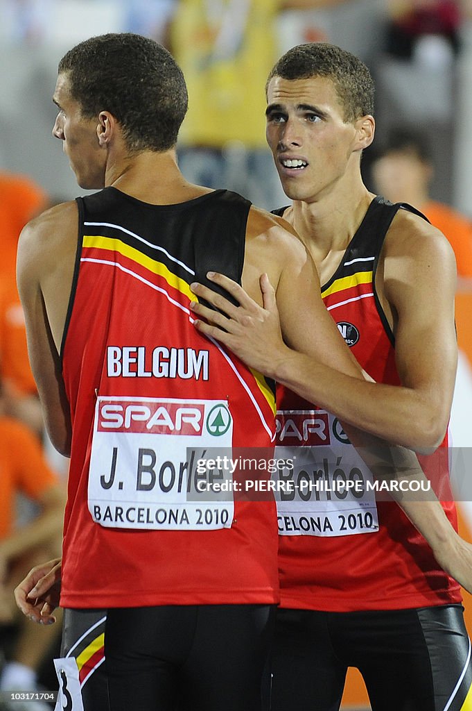 Belgium's Kevin Borlee (R) is congratula