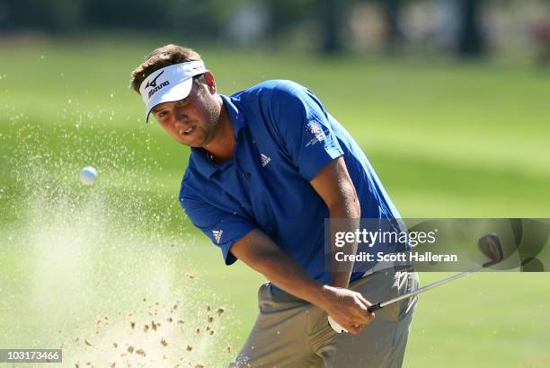 Jeff Overton plays a bunker shot on the 17th hole during the second round of the Greenbrier Classic on The Old White Course at the Greenbrier Resort...