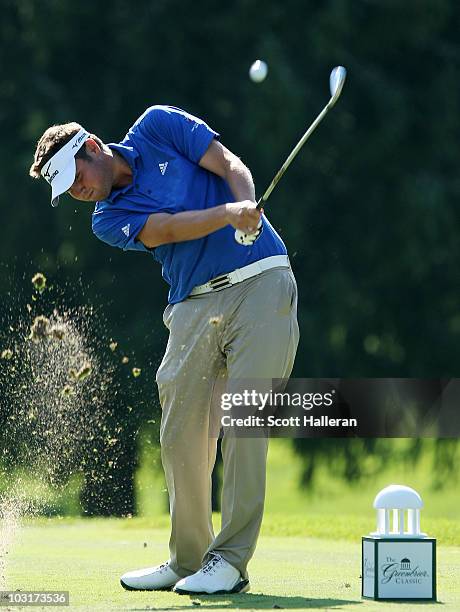 Jeff Overton hits his tee shot on the third hole during the second round of the Greenbrier Classic on The Old White Course at the Greenbrier Resort...