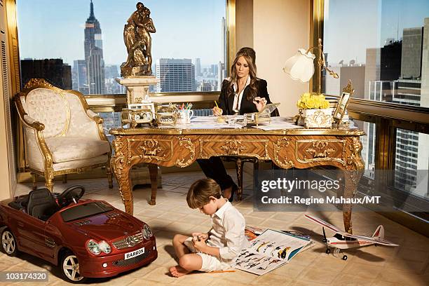 Melania Trump and her son Barron Trump pose for a portrait on April 14, 2010 in New York City. Melania Trump is wearing a suit and shirt by Dolce &...